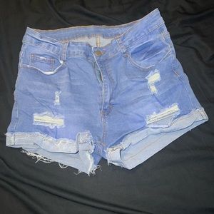 SHEIN SXY Ripped Raw Hem Devil Shorts